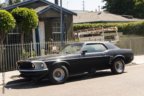 Side view of a classic vintage American muscle car in the street