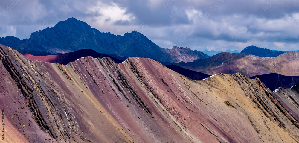 Fototapeta premium Colorful Mountains in the Andes with Cumulus Clouds