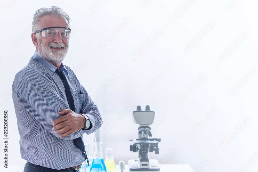 Chemistry professor scientist in science chemical standing happy smile with copy space. Chemistry professor scientist in science chemical standing happy smile with copy space.
