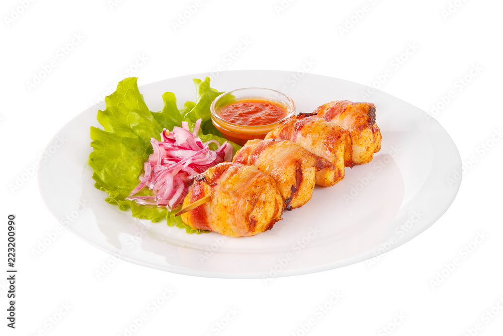 Shish kebab, beef, lamb, pork, chicken in bacon grilled meat, barbecue, without garnish on a plate, isolated on white background. Marinated red onion, ketchup, tomato red sauce. Side view For the menu