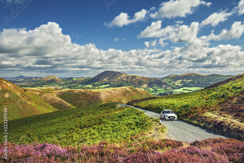 White Car on the Top of Scenic Hill with Amazing View