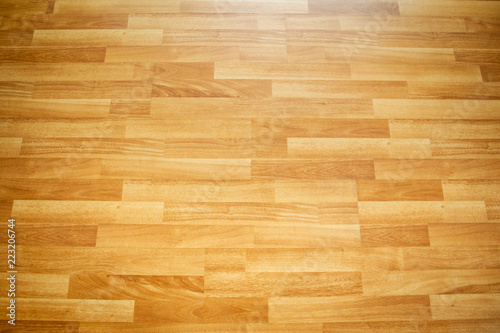 Luxury laminate wood floor from top angle view showing the beautiful wood detail. © DG PhotoStock