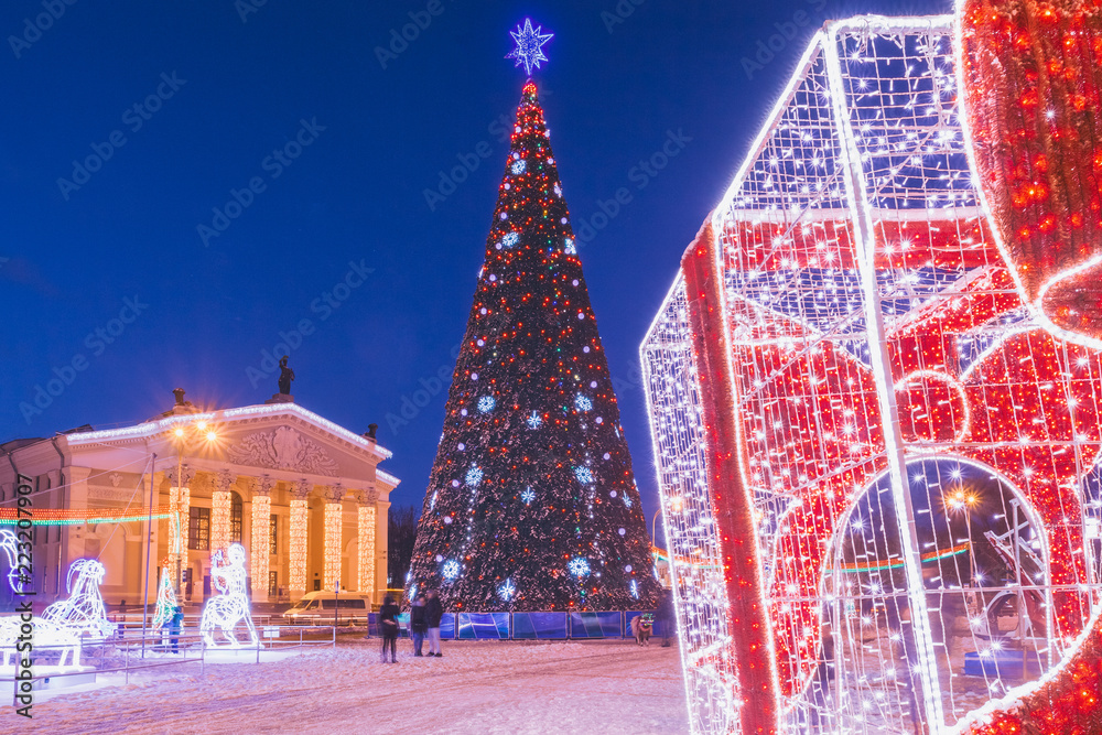 Christmas tree in the town square with decorations