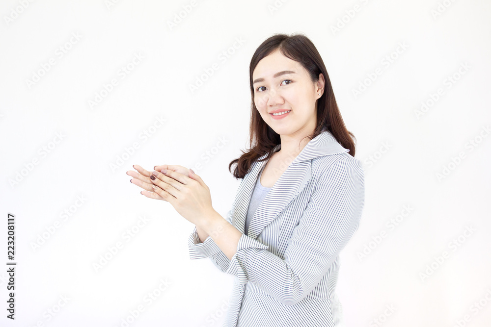 Smart and beautiful Asian business women age between 26-30 years old clapping, close up haft body on white background. Smart and beautiful Asian business women age between 26-30 years old clapping, close up haft body on white background.