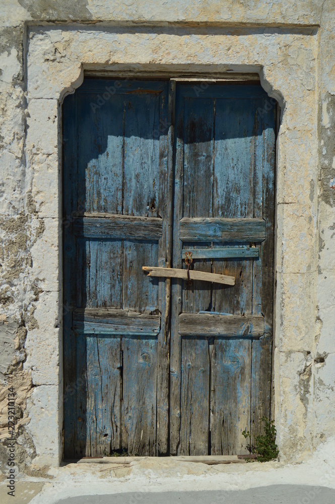 Beautiful Blue Wooden Door Of A Typical House In Pyrgos Kallistis On The Island Of Santorini. Travel, Cruises, Architecture, Landscapes. July 7, 2018. Fira, Santorini Island, Greece.