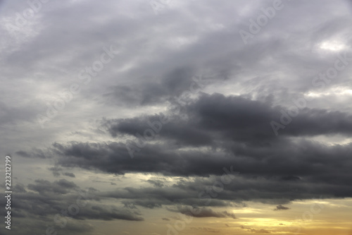 sunset sky with storm clouds background