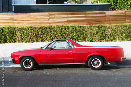 Side view of a classic vintage American car in the street