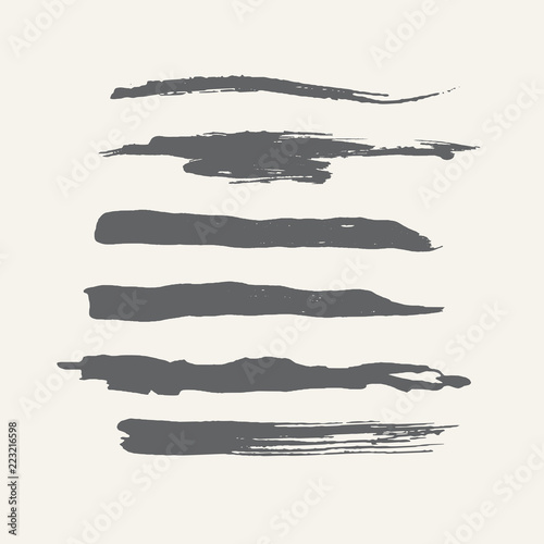 Abstract grunge curly handmade grey brushes. Digital vector collection.