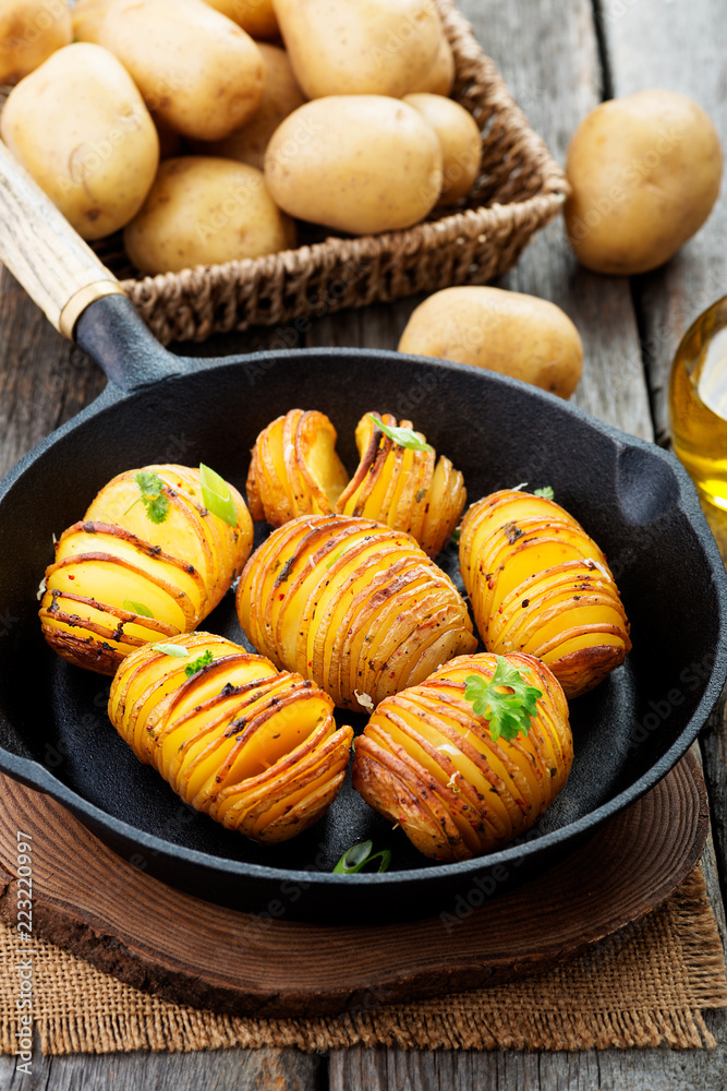 Baked potato with cheese and olive oil. Baked potato with cheese and olive oil.