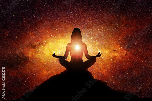 Obraz na plátně Silhouette of woman with universe background