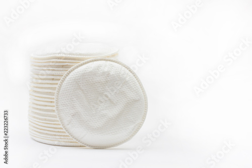 round cotton swabs inserts bra for nursing mothers on white background with copy space