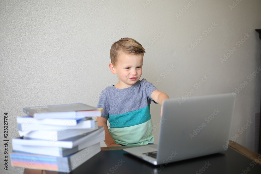 Young boy using computer Young boy using computer