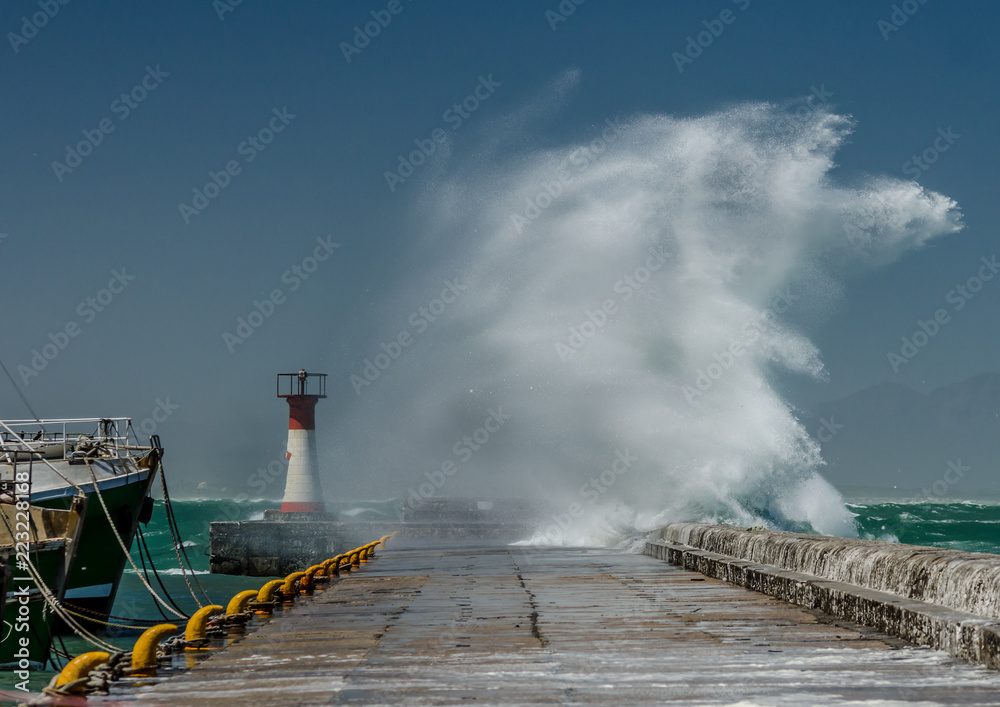 Stormy waves hitting a Harbor wall