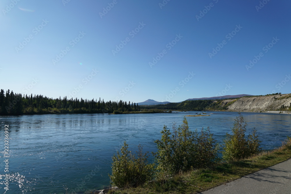 Whitehorse,Canada-September 10, 2018: Yukon River flowing in Whitehorse, Canada in September