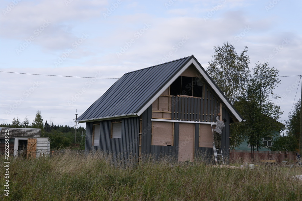 обшивка каркасного дома доской, скандинавский стиль