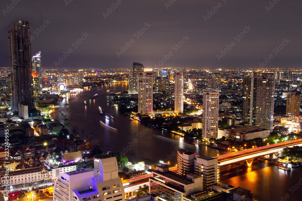 Landscape night river city Bangkok skyline 