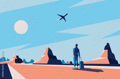 man looking at a plane in the sky