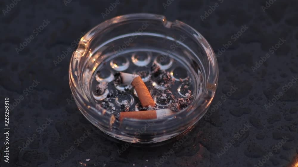 Ash tray close up above smoke