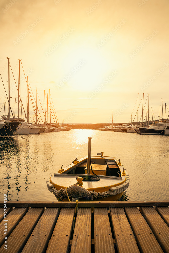 Boat at sunset in Adriatic sea