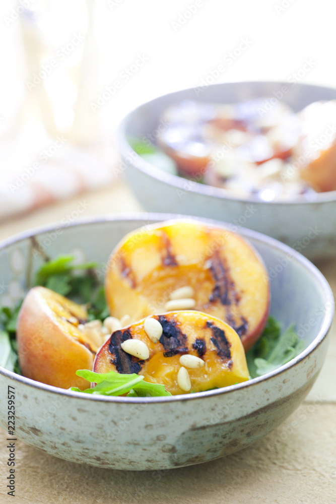 Grilled peach salad with arugula and pine nuts Grilled peach salad with arugula and pine nuts