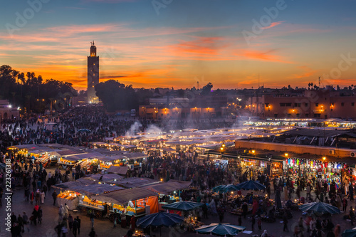 Crowd in Jemaa el Fna square at sunset, Marrakesh, Morocco photo