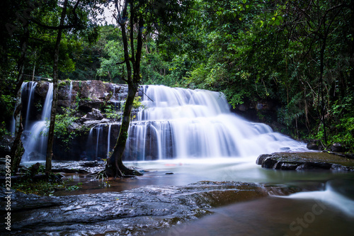 Fototapeta Naklejka Na Ścianę i Meble -  Pang Sida waterfall during rainy season. The beautiful waterfall in deep forest at Pang Si Da National Park, Srakaew Thailand