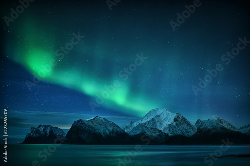 Northern lights over Mt. Himmeltinden, Lofoten, Nordland, Norway photo