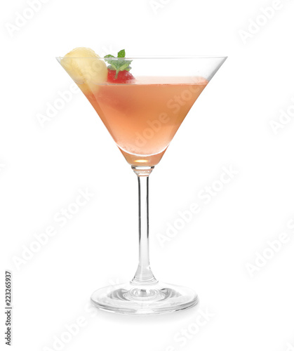 Glass with melon ball drink on white background
