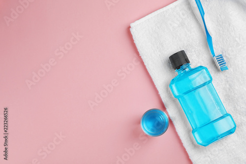 Fototapeta Naklejka Na Ścianę i Meble -  Flat lay composition with oral care products and space for text on color background. Teeth hygiene