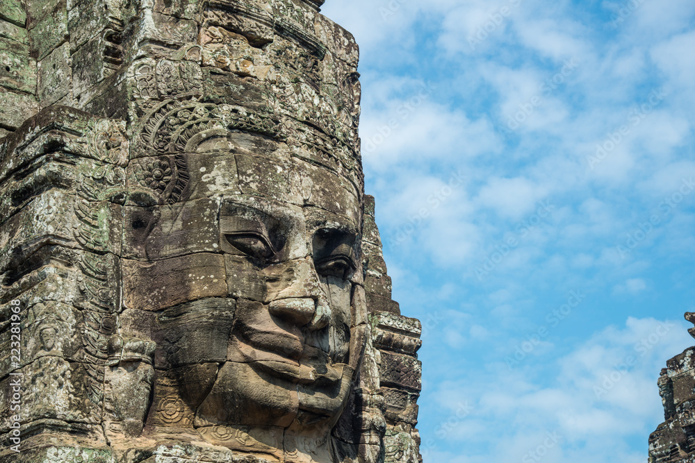 The mystery face towers in Bayon temple, temple of King Jayavarman VII. The faces were believed to represent Brahma, the Hindu God of creation but some believe that it is the King himself.