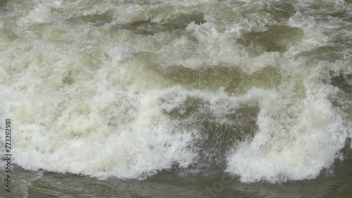 Standing wave in Rio Toachi, Ecuador slow motion. On the western slopes of the Andes, this river feeds a hydroelectric project. photo