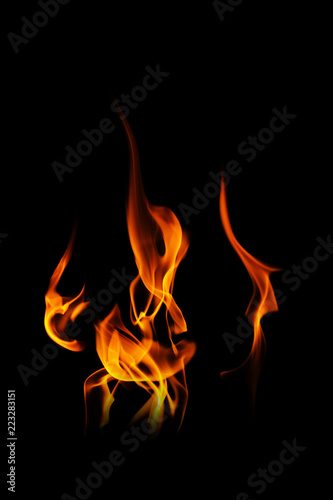 Fire flames on black background © hideto111