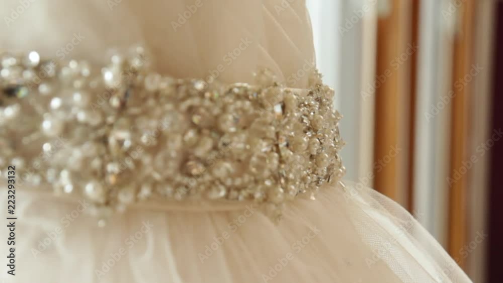 Wedding dress long broach rack focus Wedding dress long broach rack focus