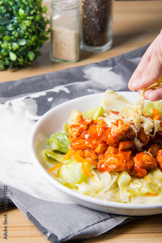 Korean spicy chicken with sauteed cabbage 