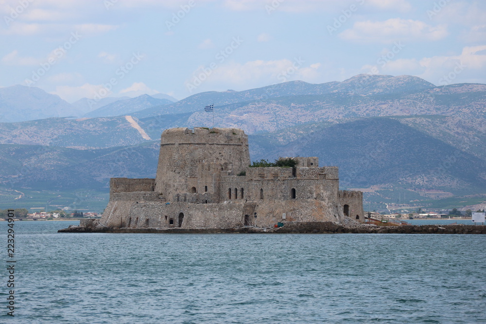 Old venetian fortress Bourtzi and surrounding landscape, Nafplio, Peloponnese, Greece