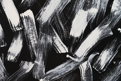 abstract wallpaper painted by white brush on black background texture.