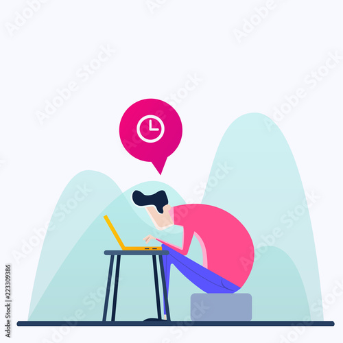 The programmer sits behind the workplace and works quickly