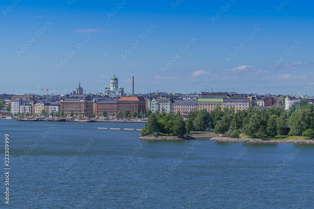 Fototapeta premium Landscape of Helsinki, Finland. View from an island over the city. Scandinavian landscape. Finnish harbour