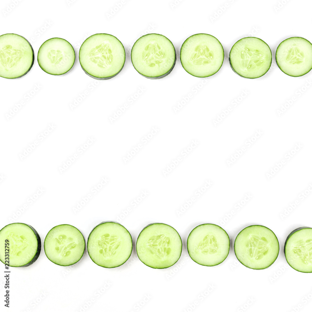 Cucumber slices forming a square frame on a white background with copyspace Cucumber slices forming a square frame on a white background with copyspace