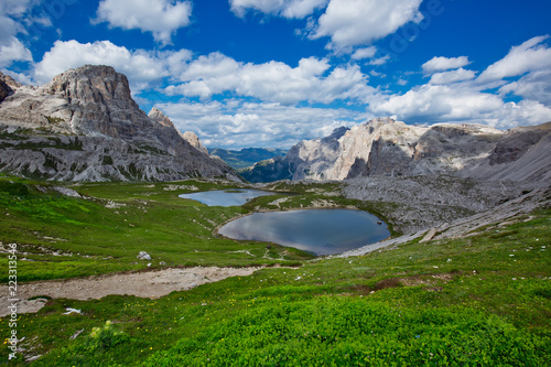 Beautiful mountainscape with cloudy sky and two small mountain lakes. Tre Cime di Lavaredo National park  Dolomites  Italy.