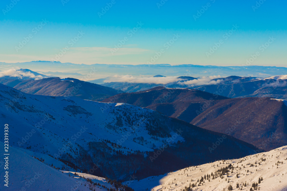 Beautiful mountain landscape over the clouds in Ukrainian Carpathians