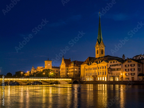 Frauenmunster Abbey and Stadthaus in Zurich at night,  Switzerland © pwmotion