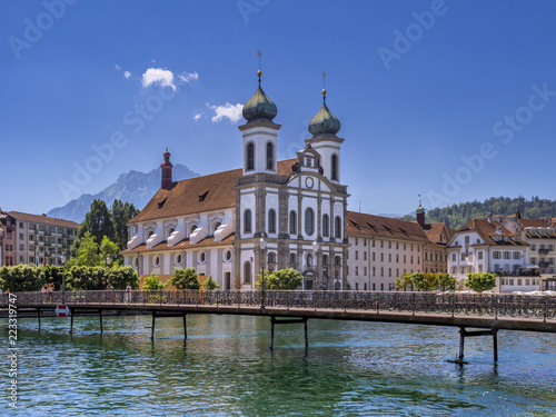Jesuit Church on the River Reuss in Lucerne, Switzerland © pwmotion
