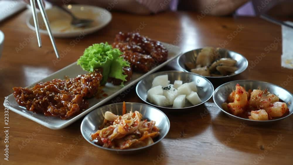 Eating Korean spicy sauce fried chicken with side dishes 4k Eating Korean spicy sauce fried chicken with side dishes 4k