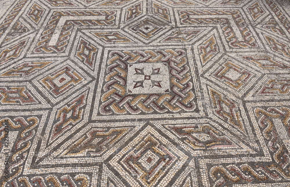 Geometric mosaic of the roman ruins of the ancient city of Conimbriga, Beiras region, Portugal