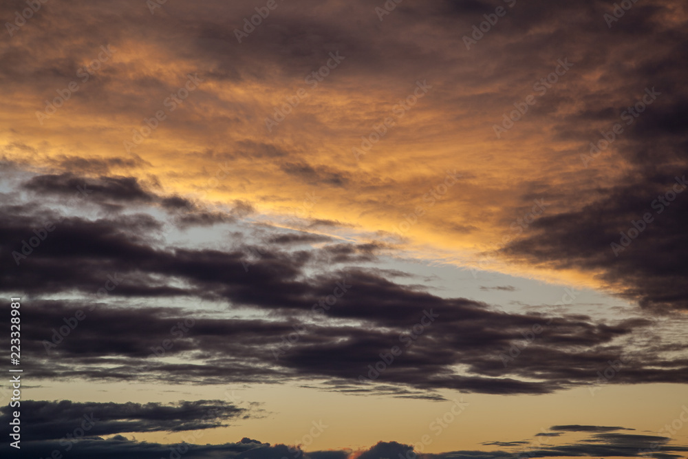 Colorful the sea sunset with  orange-violet paints