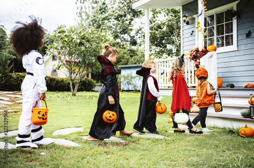 Little children trick or treating photo