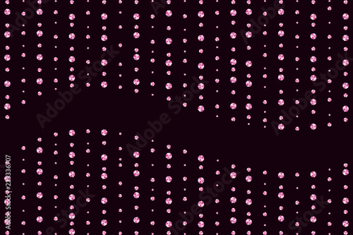 Sparkling pink diamonds on dark background