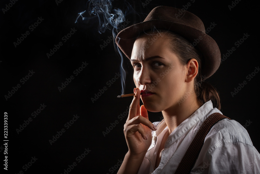 Fototapeta premium woman smoking cigarette