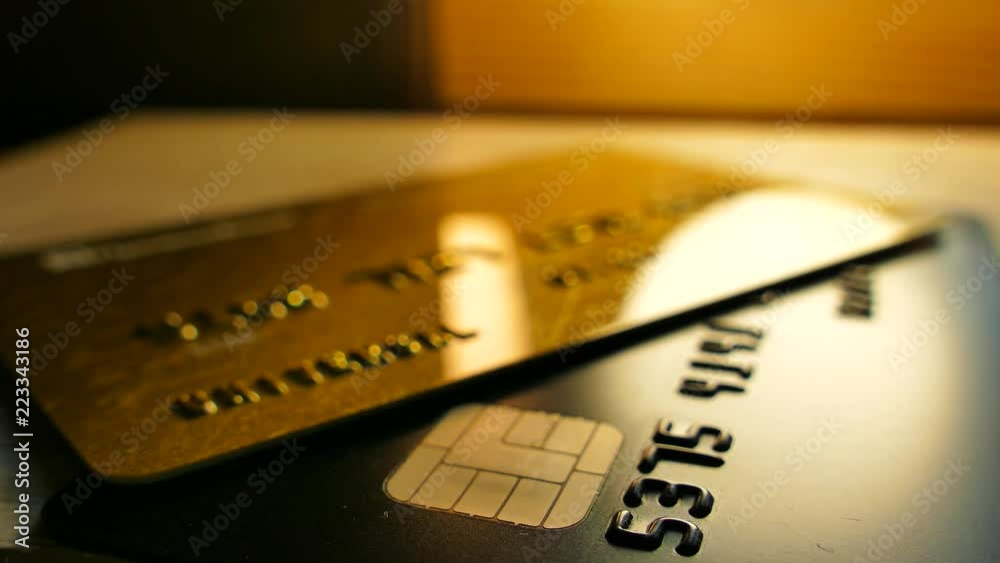 Money in bank accounts. Credit bank cards are on the table. Cashless payments.